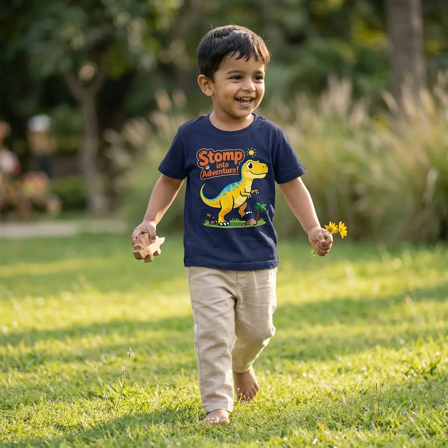 Kid wearing navy blue dinosaur print t-shirt dino stomp design  lifestyle-boy