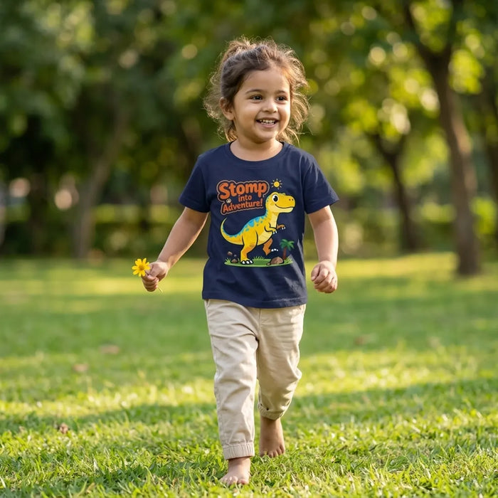 Kid wearing navy blue dinosaur print t-shirt dino stomp design  lifestyle-girl