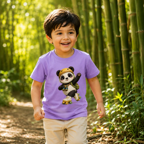 A young boy smiling while walking in a bamboo forest, wearing a light purple t-shirt with a cartoon panda graphic and beige pants. lifestyle-boy